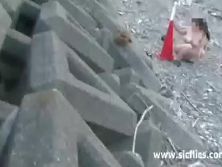 Giant road cone fuck at a public beach